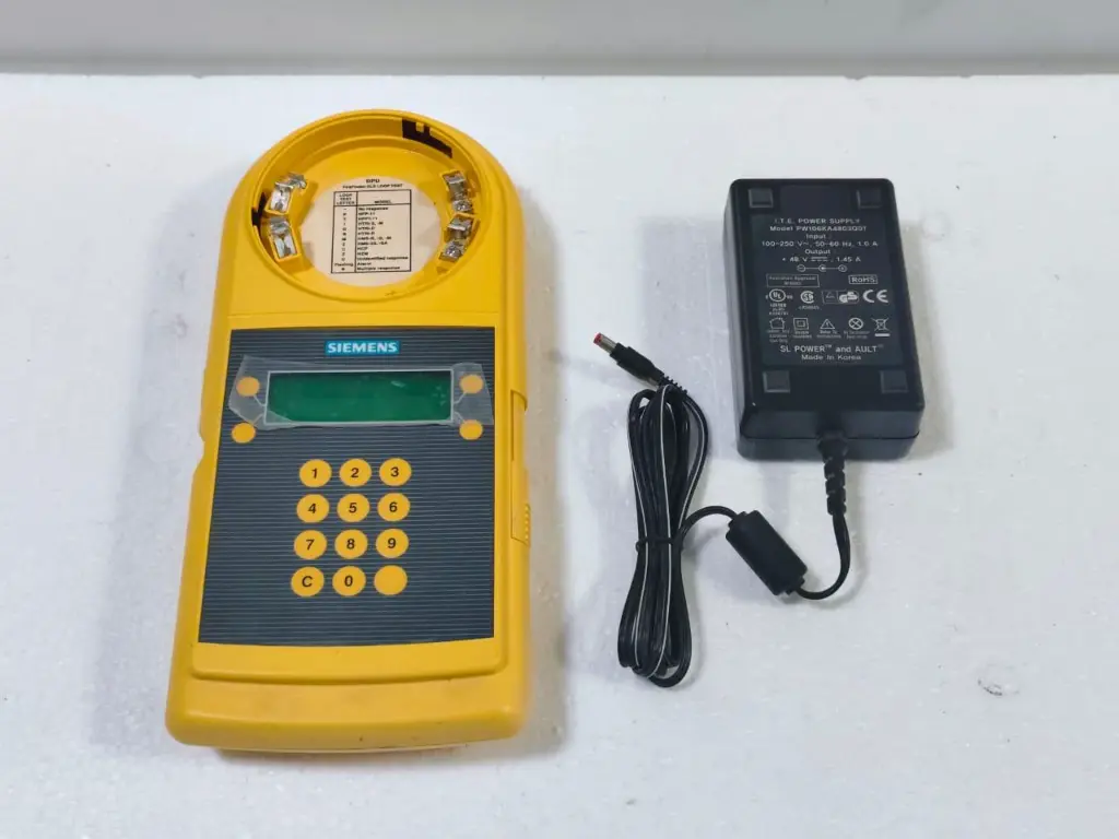 SIEMENS DPU FIRE ALARM DEVICE PROGRAMMER WORKING WITH Please note this is New equipment with a 3-month warranty. 